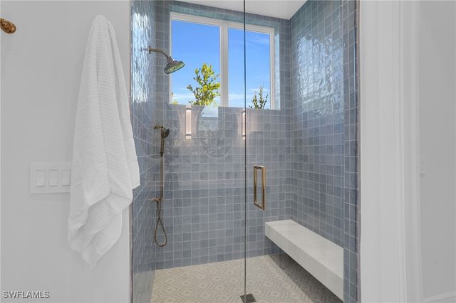 555 Whispering Pine LN, Naples, FL 34103