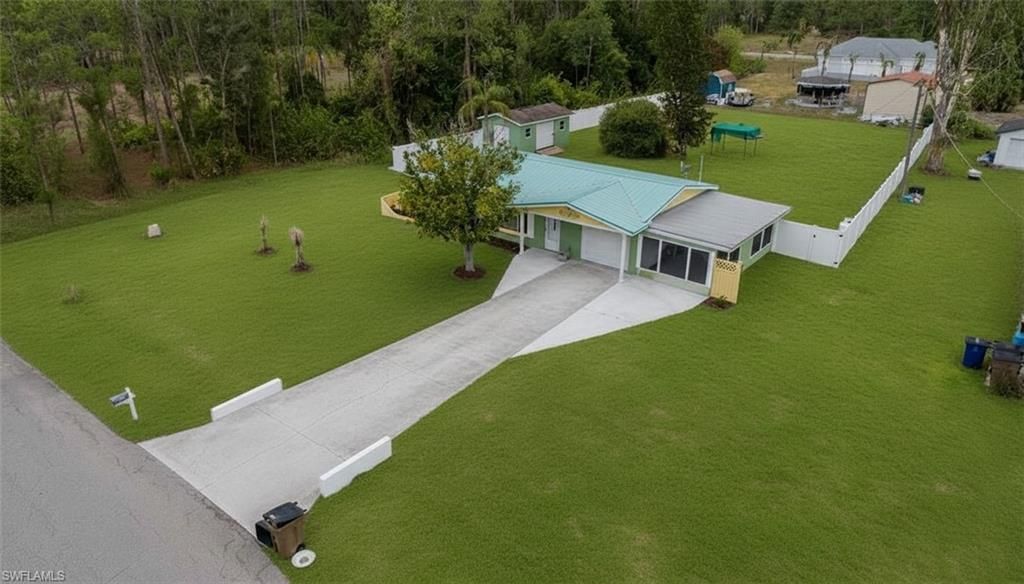 1313 Cleveland AVE, LEHIGH ACRES, FL 33972 — exterior