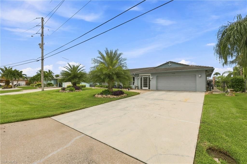 1024 E Archer PKWY, CAPE CORAL, FL 33904 — photo 3