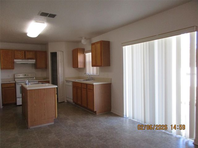 2623 HUNLEY LOOP, Kissimmee, FL 34743