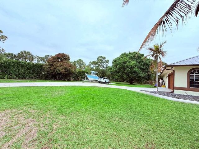 13383 TEMPLE Boulevard, The Acreage, FL 33412