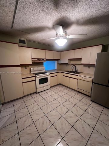 4975 E Sabal Palm Blvd 304, Tamarac, FL 33319