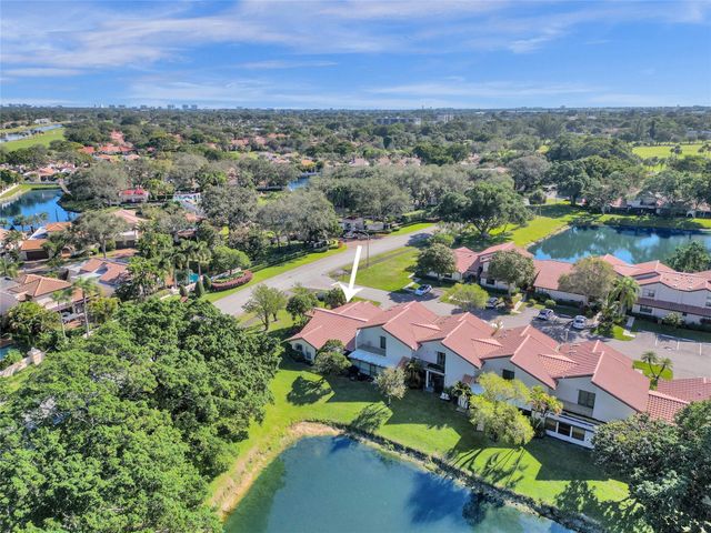 609 Deer Creek Lake Point Lane, Deerfield Beach, FL 33442