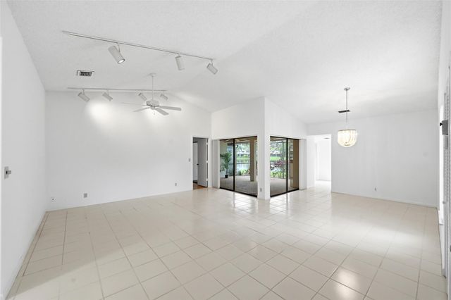 609 Deer Creek Lake Point Lane, Deerfield Beach, FL 33442