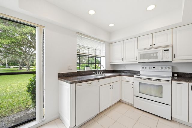 609 Deer Creek Lake Point Lane, Deerfield Beach, FL 33442