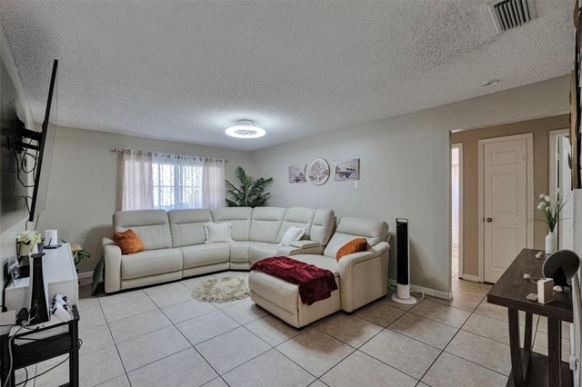 9724 CYPRESS POND AVENUE, Tampa, FL 33647