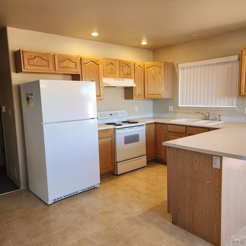 303 E Larchmont Dr, Pueblo West, CO 81007