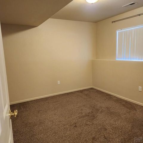 303 E Larchmont Dr, Pueblo West, CO 81007