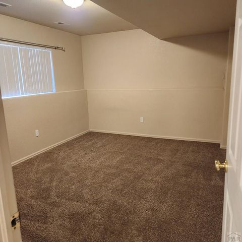 303 E Larchmont Dr, Pueblo West, CO 81007