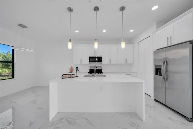 1216 Clayton AVE, Lehigh Acres, FL 33972