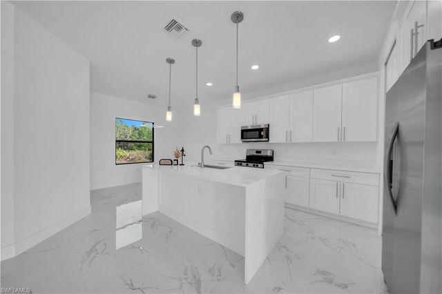 1216 Clayton AVE, Lehigh Acres, FL 33972