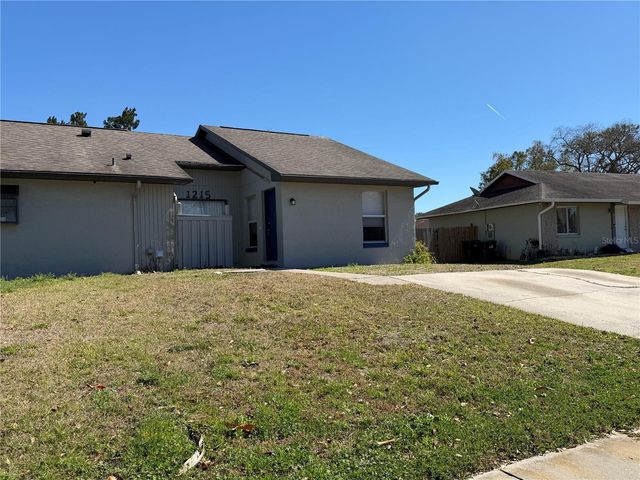 1215 RAVIDA CIRCLE, Orlando, FL 32825