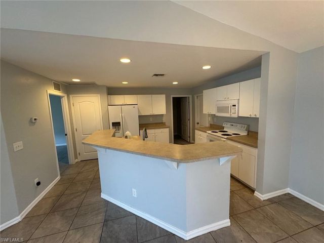 1063 Peach ST, Lehigh Acres, FL 33974