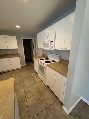 1063 Peach ST, Lehigh Acres, FL 33974