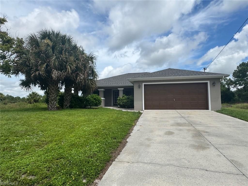 1063 Peach ST, Lehigh Acres, FL 33974
