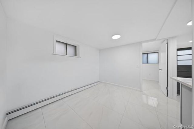 67-17 50th Avenue, Woodside, NY 11377