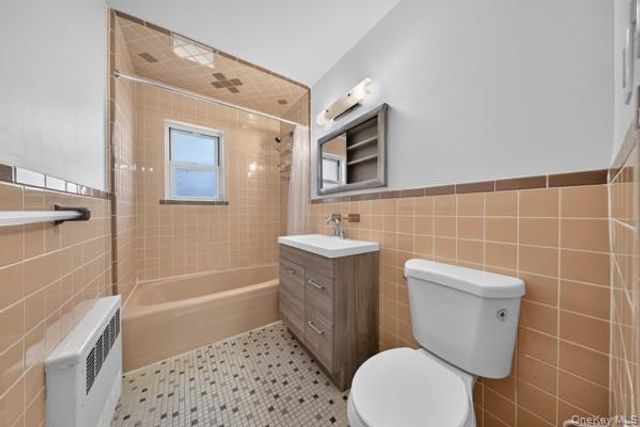 67-17 50th Avenue, Woodside, NY 11377
