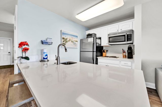 114 Carillon Market Street, 402, Panama City Beach, FL 32413