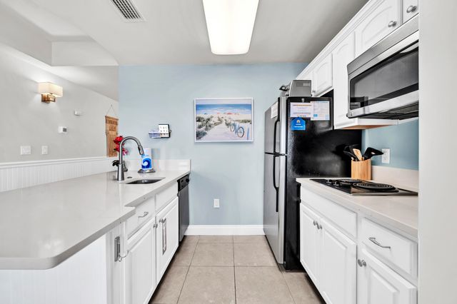 114 Carillon Market Street, 402, Panama City Beach, FL 32413