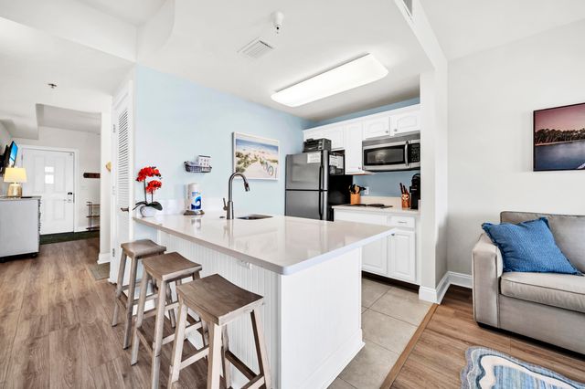 114 Carillon Market Street, 402, Panama City Beach, FL 32413