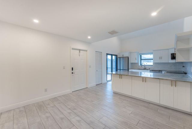 302 Summerwinds Lane, Jupiter, FL 33458