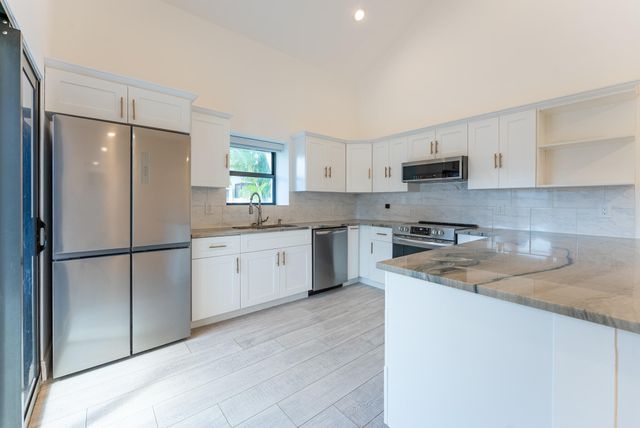 302 Summerwinds Lane, Jupiter, FL 33458