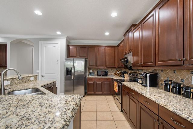 945 DESERT MOUNTAIN COURT, Reunion, FL 34747