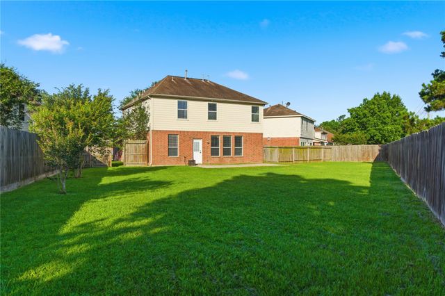 12327 Granite Woods Court, Humble, TX 77346