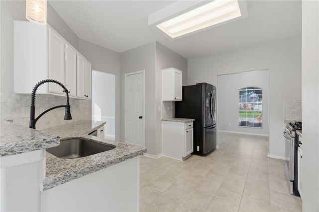 12327 Granite Woods Court, Humble, TX 77346