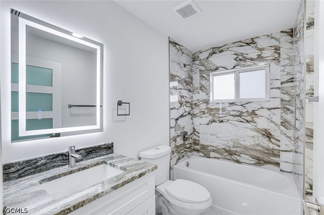 3020 1st ST W, Lehigh Acres, FL 33971