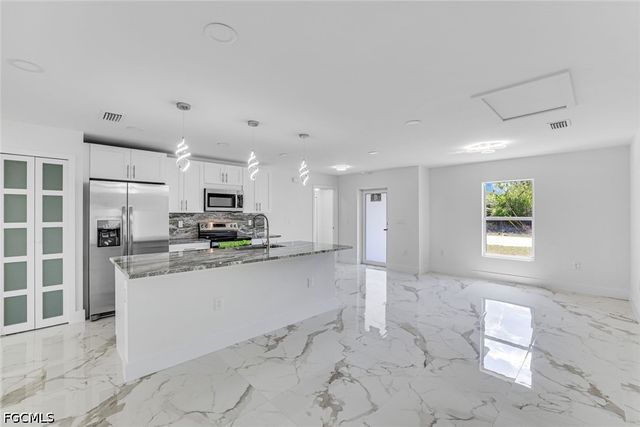 3020 1st ST W, Lehigh Acres, FL 33971