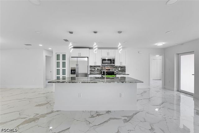 3020 1st ST W, Lehigh Acres, FL 33971