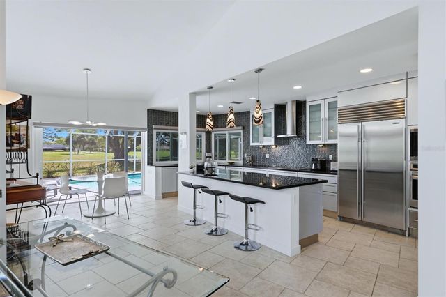 3906 SPYGLASS HILL ROAD, Sarasota, FL 34238