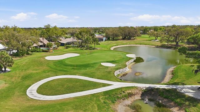 3906 SPYGLASS HILL ROAD, Sarasota, FL 34238