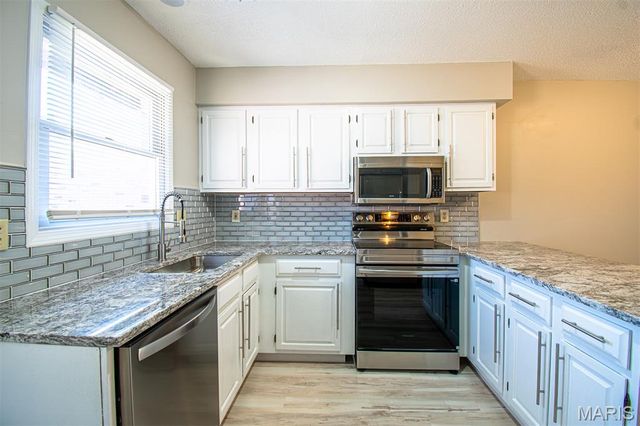 30 TARPON Court, Florissant, MO 63033