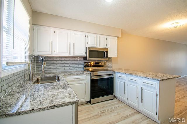 30 TARPON Court, Florissant, MO 63033