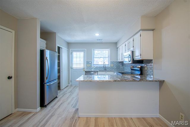 30 TARPON Court, Florissant, MO 63033