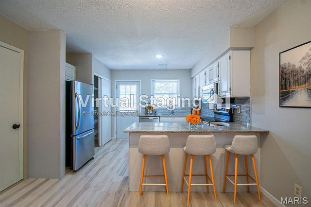 30 TARPON Court, Florissant, MO 63033