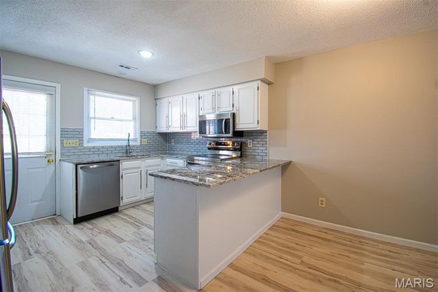 30 TARPON Court, Florissant, MO 63033