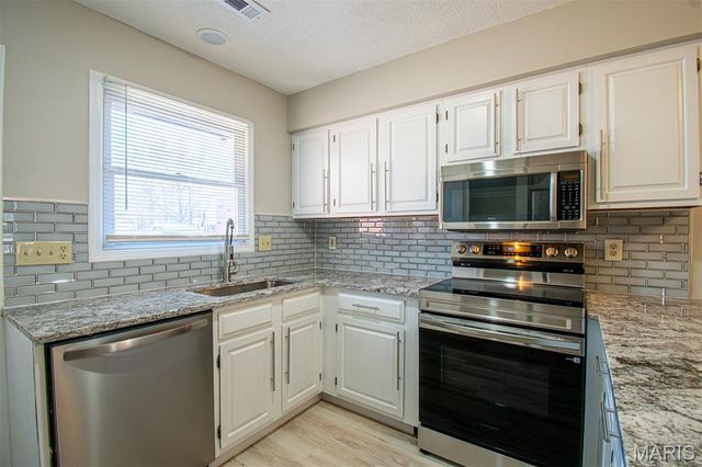 30 TARPON Court, Florissant, MO 63033