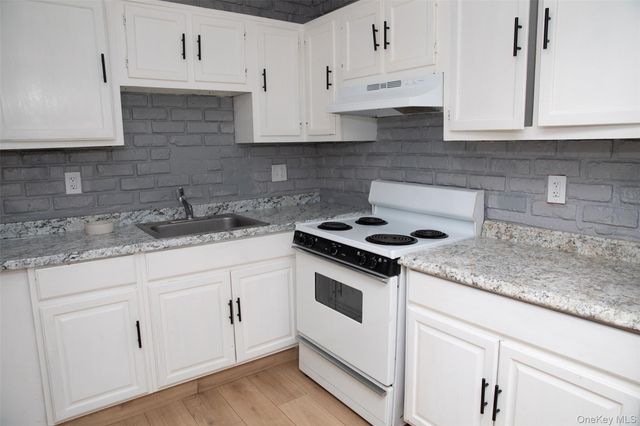 1 A Jamestown Court, Ridge, NY 11961