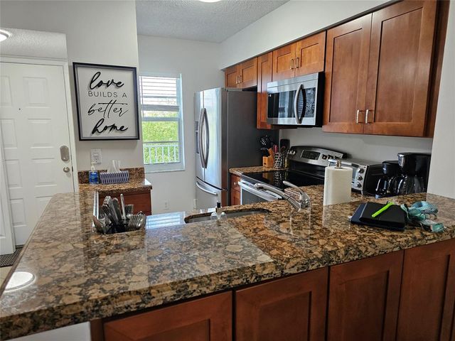 2222 N Cypress Bend 309, Pompano Beach, FL 33069