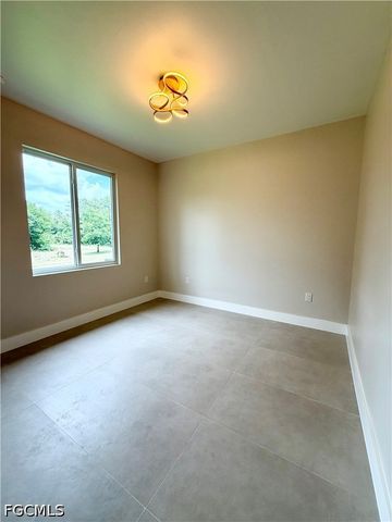 1013 Lincoln AVE, Lehigh Acres, FL 33972