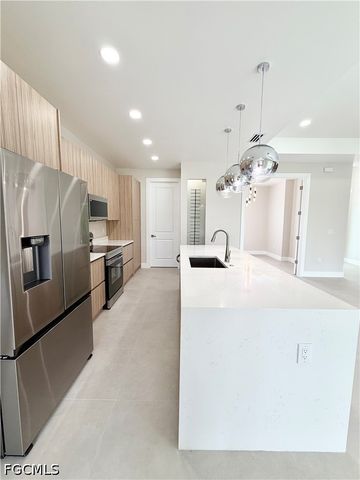 1013 Lincoln AVE, Lehigh Acres, FL 33972