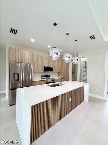 1013 Lincoln AVE, Lehigh Acres, FL 33972