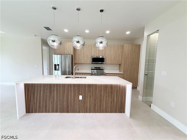 1013 Lincoln AVE, Lehigh Acres, FL 33972