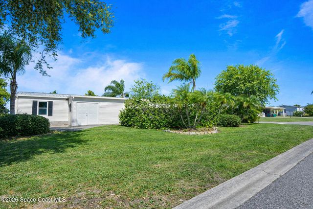 922 Bougainvillea Circle, Barefoot Bay, FL 32976