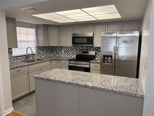4015 ASHFORD GREEN PLACE D202, Tampa, FL 33613