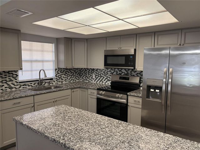 4015 ASHFORD GREEN PLACE D202, Tampa, FL 33613