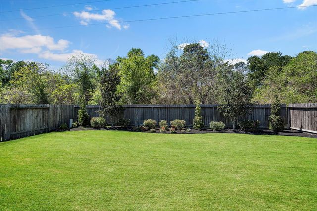 15623 Whisper Woods Drive, Cypress, TX 77429